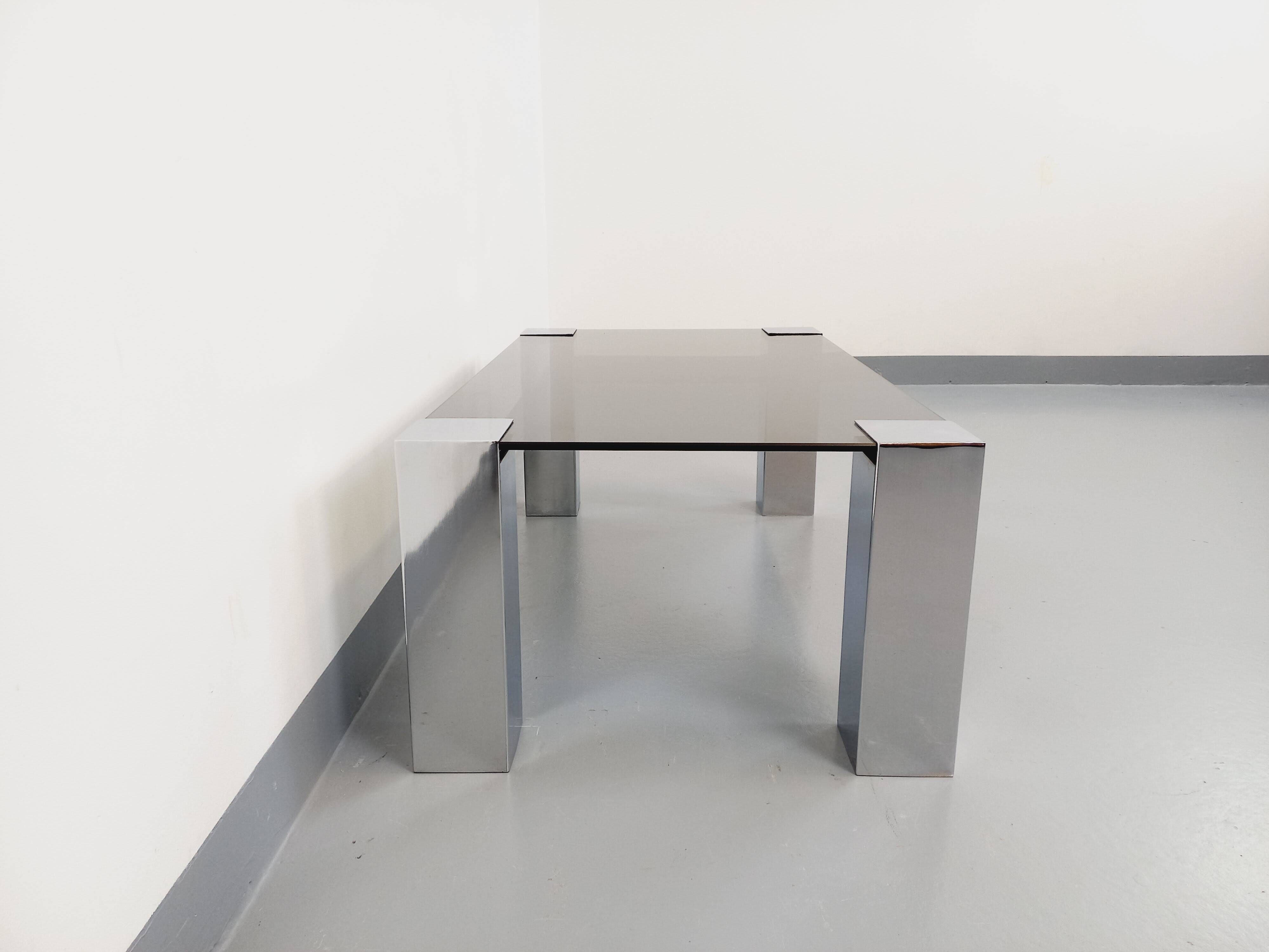 Vintage Italian coffee table Cidue in smoked glass and chrome metal from the 70s