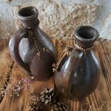 Dark brown stoneware jugs and pitchers with their cord