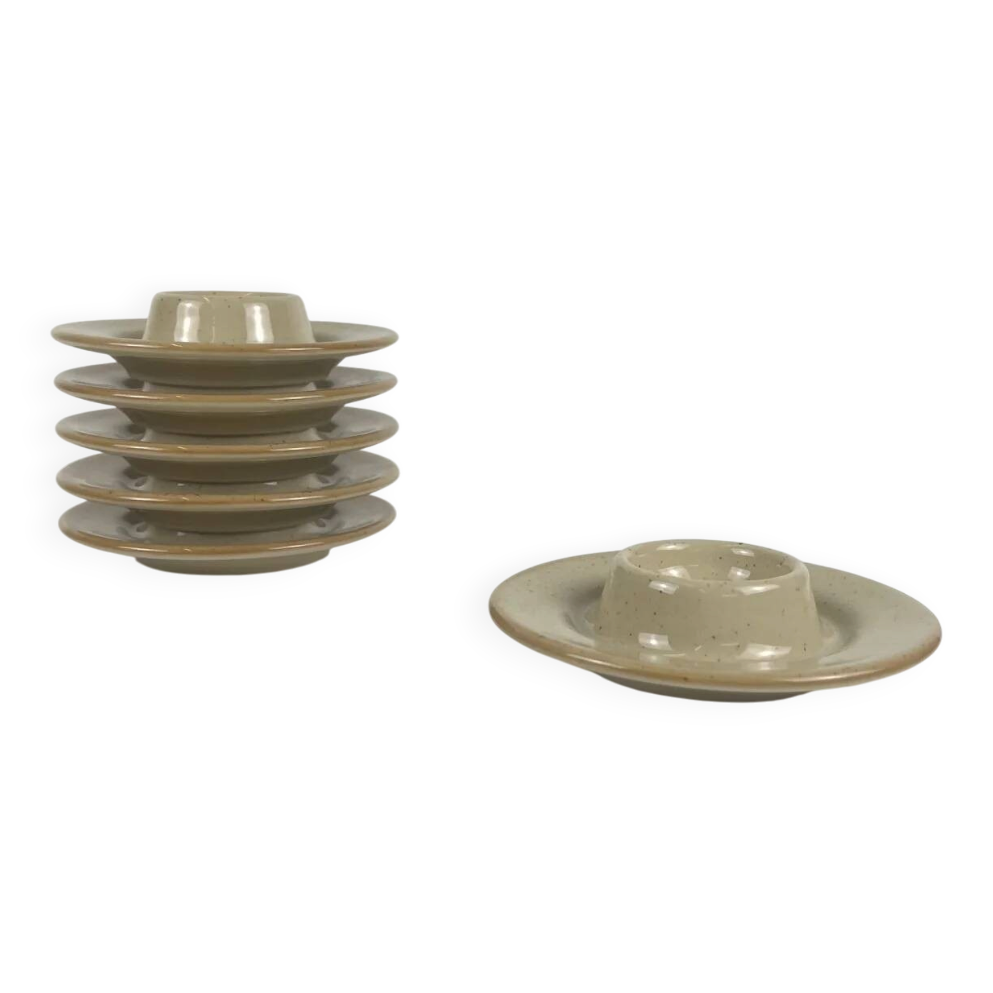 Set of 6 speckled beige ceramic egg cups.