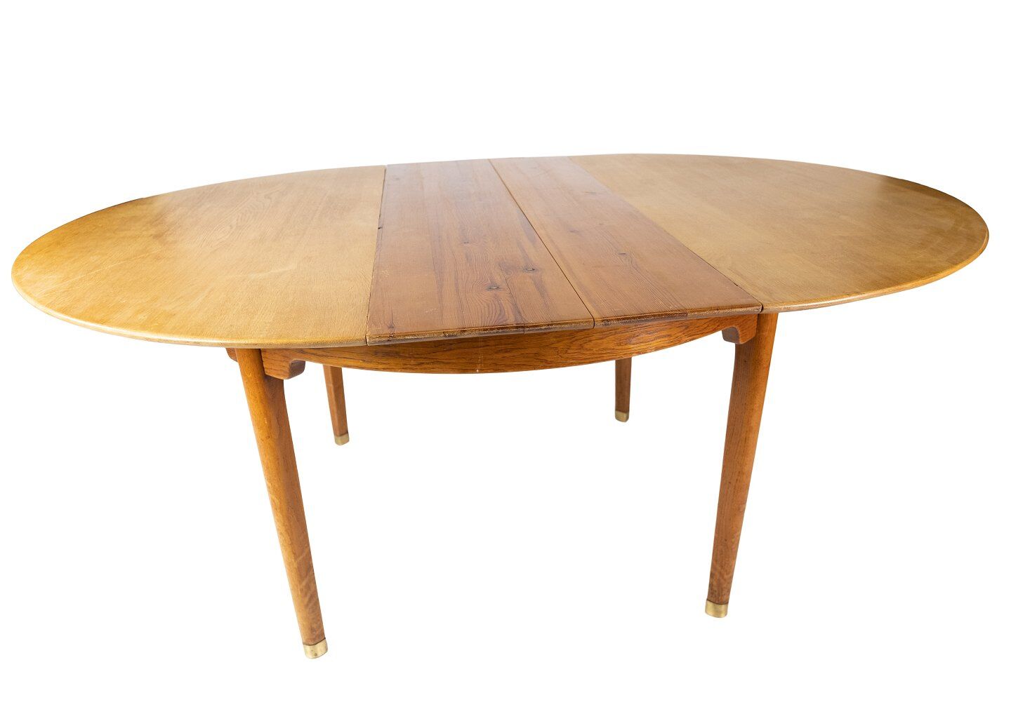 Dining table in oak of danish design from the 1960s.