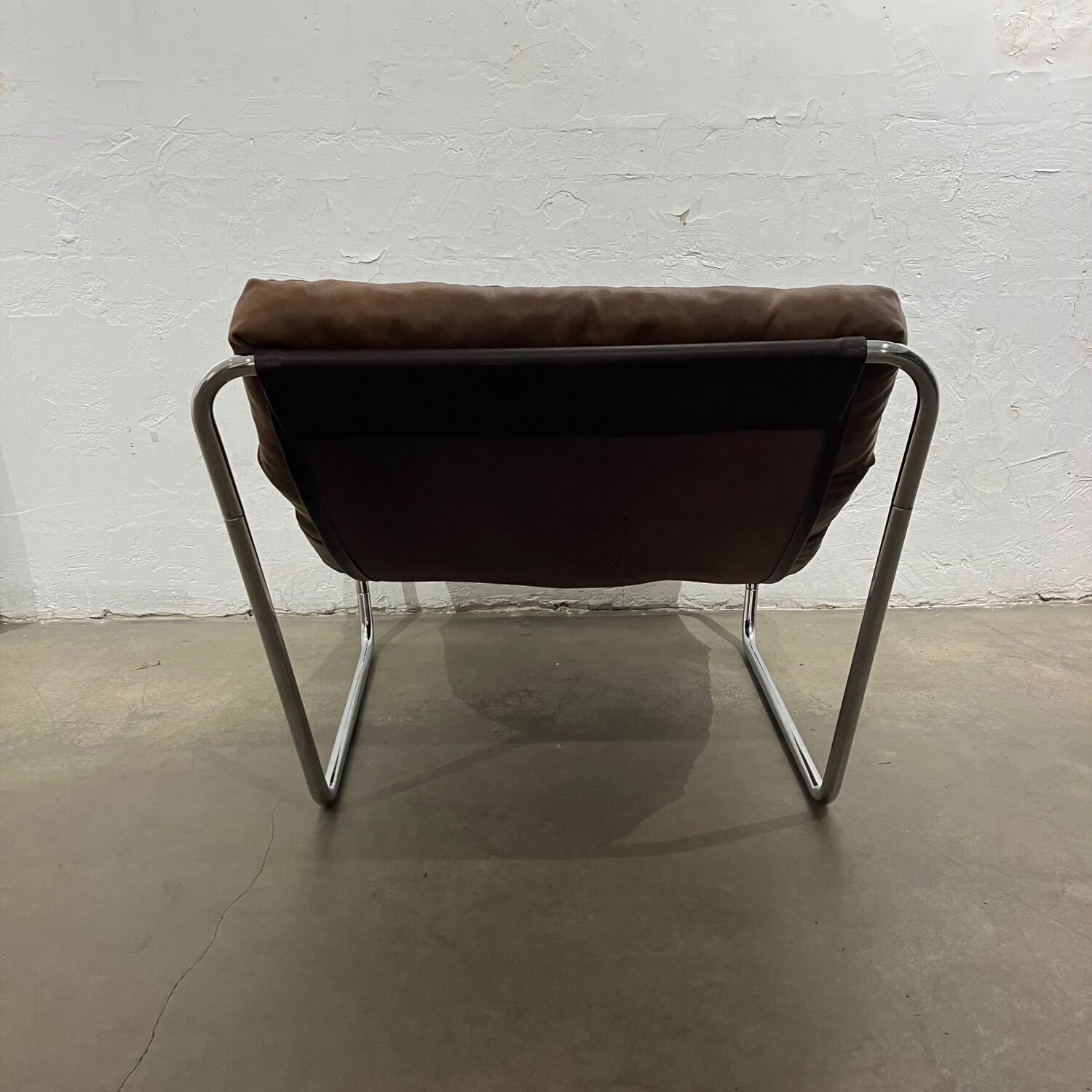 Tubular armchair