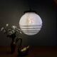 Suspension globe vintage en verre de clichy blanc et or