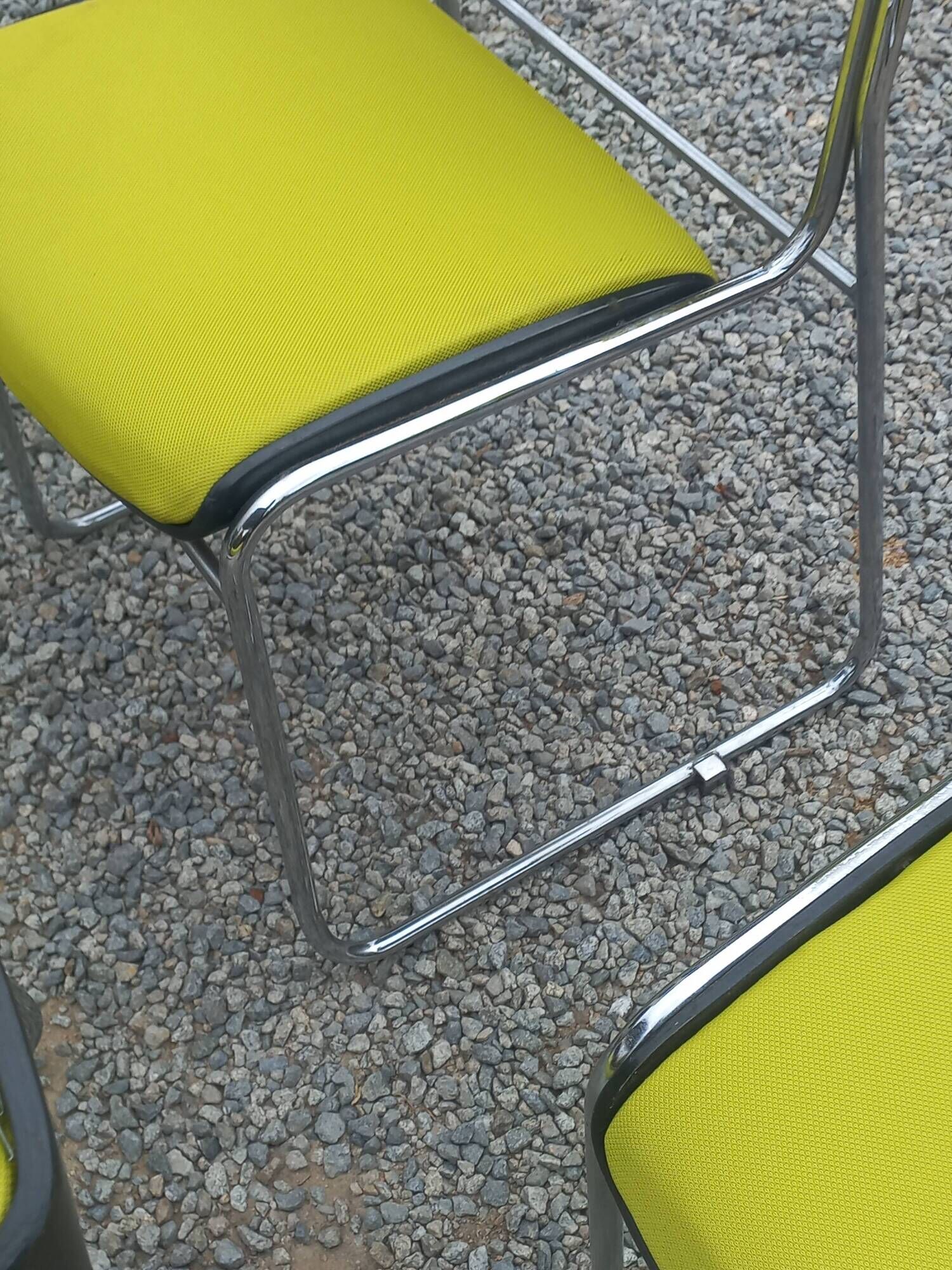 Set of 6 designer chairs with wooden seats and backs, chrome legs.