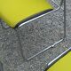 Set of 6 designer chairs with wooden seats and backs, chrome legs.