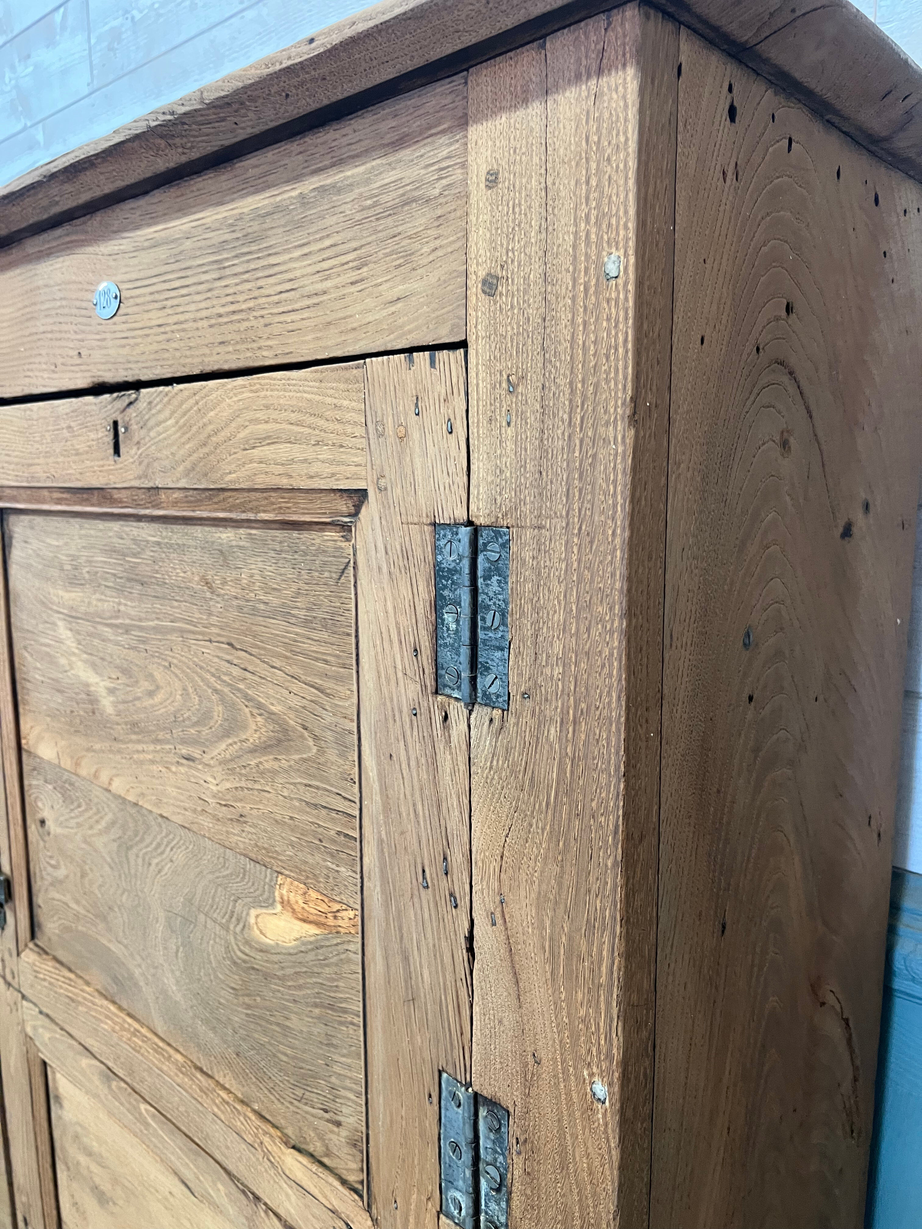 Brutalist countryside wardrobe in raw oak
