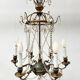 Louis XVI style chandelier with a pearl garland and painted tin, 20th century.