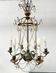 Louis XVI style chandelier with a pearl garland and painted tin, 20th century.