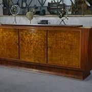 Art Deco rosewood sideboard with gilt door, attributed to Maison Dominique, 1940s