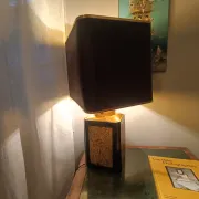 Large ceramic lamp with an Asian theme.