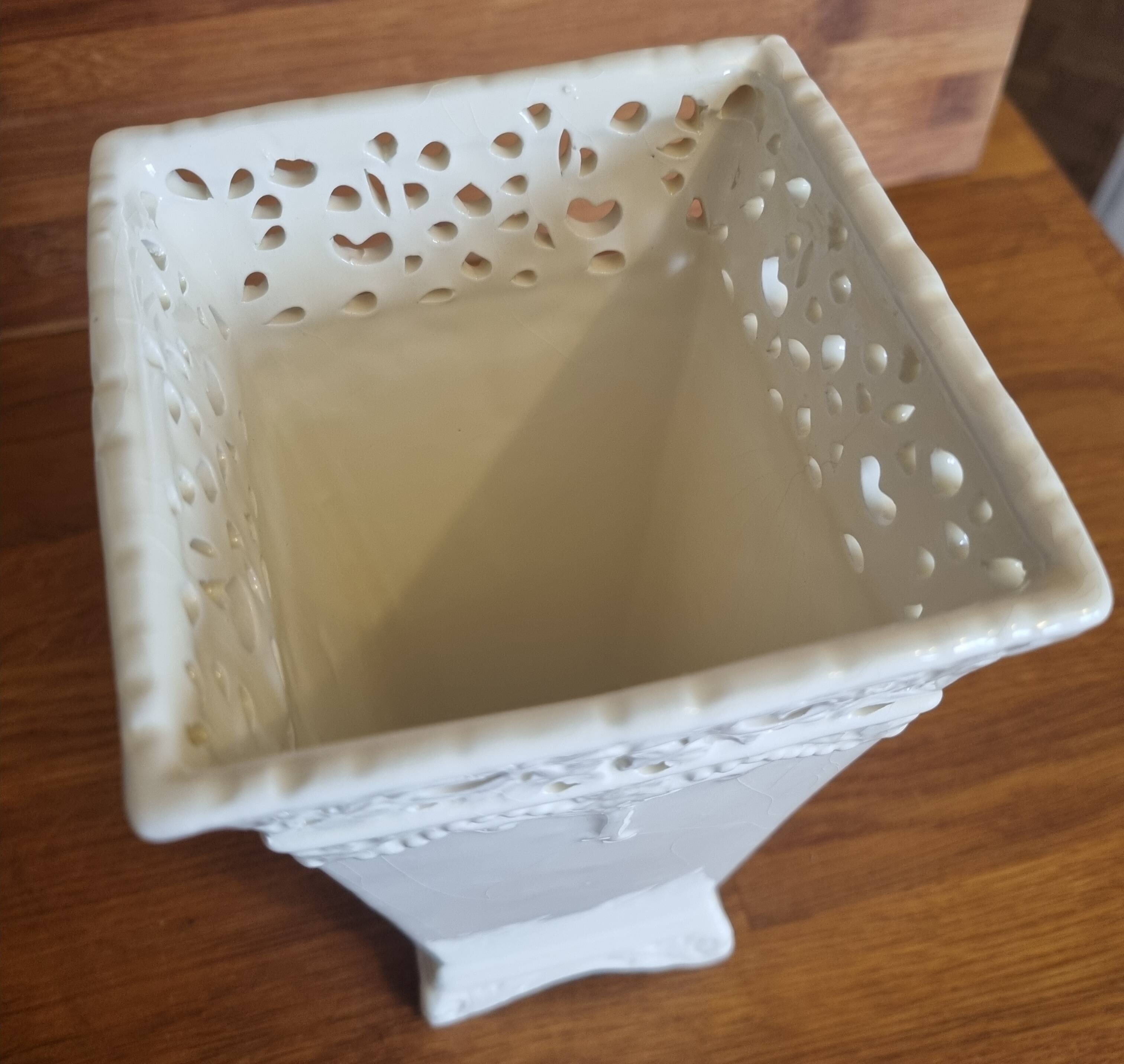 Vintage ceramic vase with lace edge