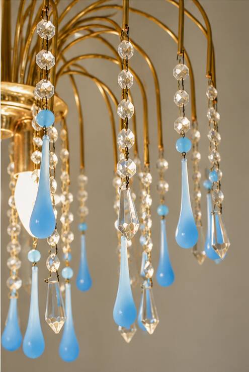 Vintage chandelier with blue Murano glass pendants.
