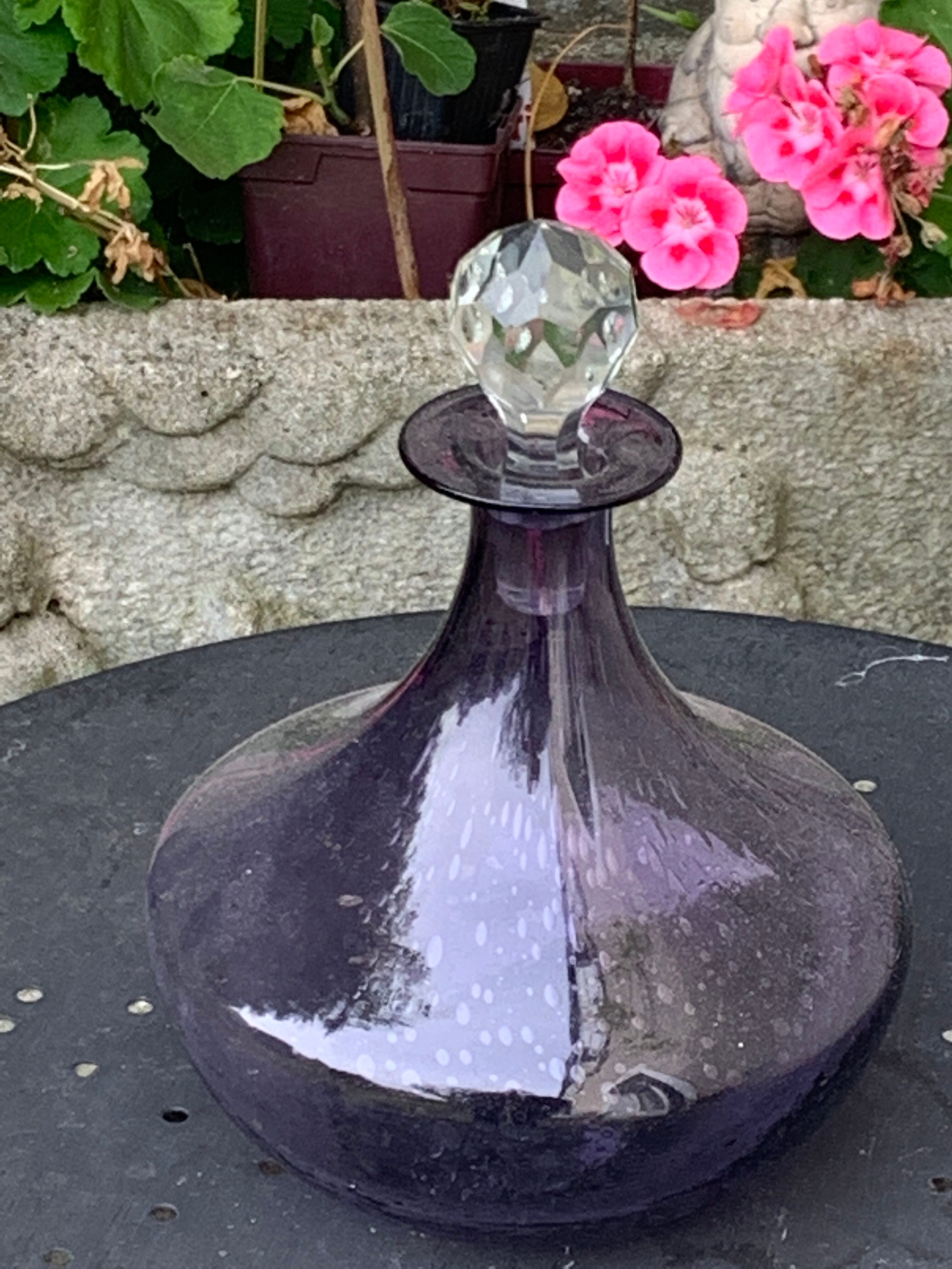 Bubble and purple blown glass decanter and faceted cut glass cap