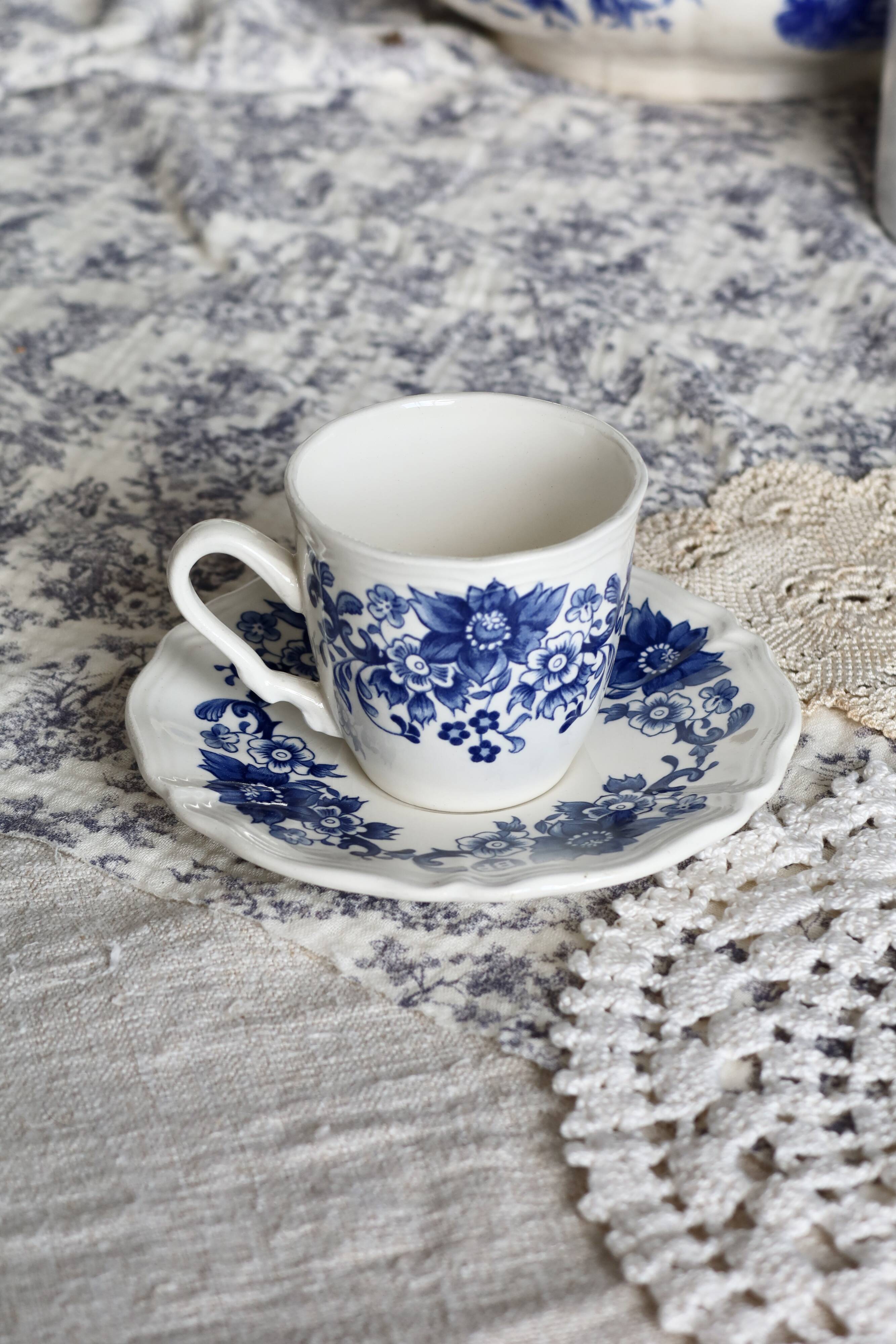 Vintage Sarreguemines cup & saucer – White earthenware with blue floral decoration