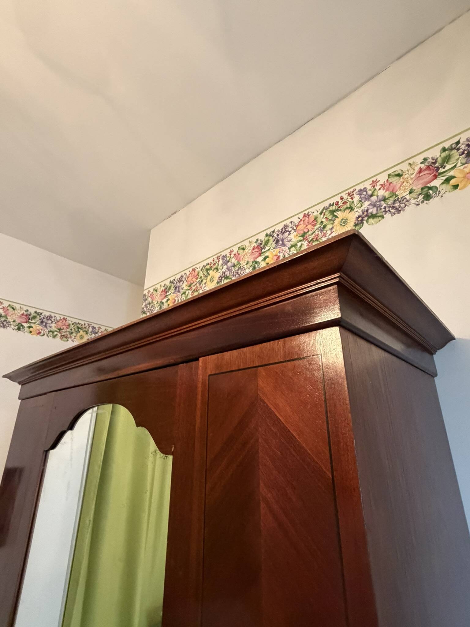 Mahogany inlaid wardrobe with a mirror