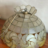 Mother-of-pearl and brass suspension