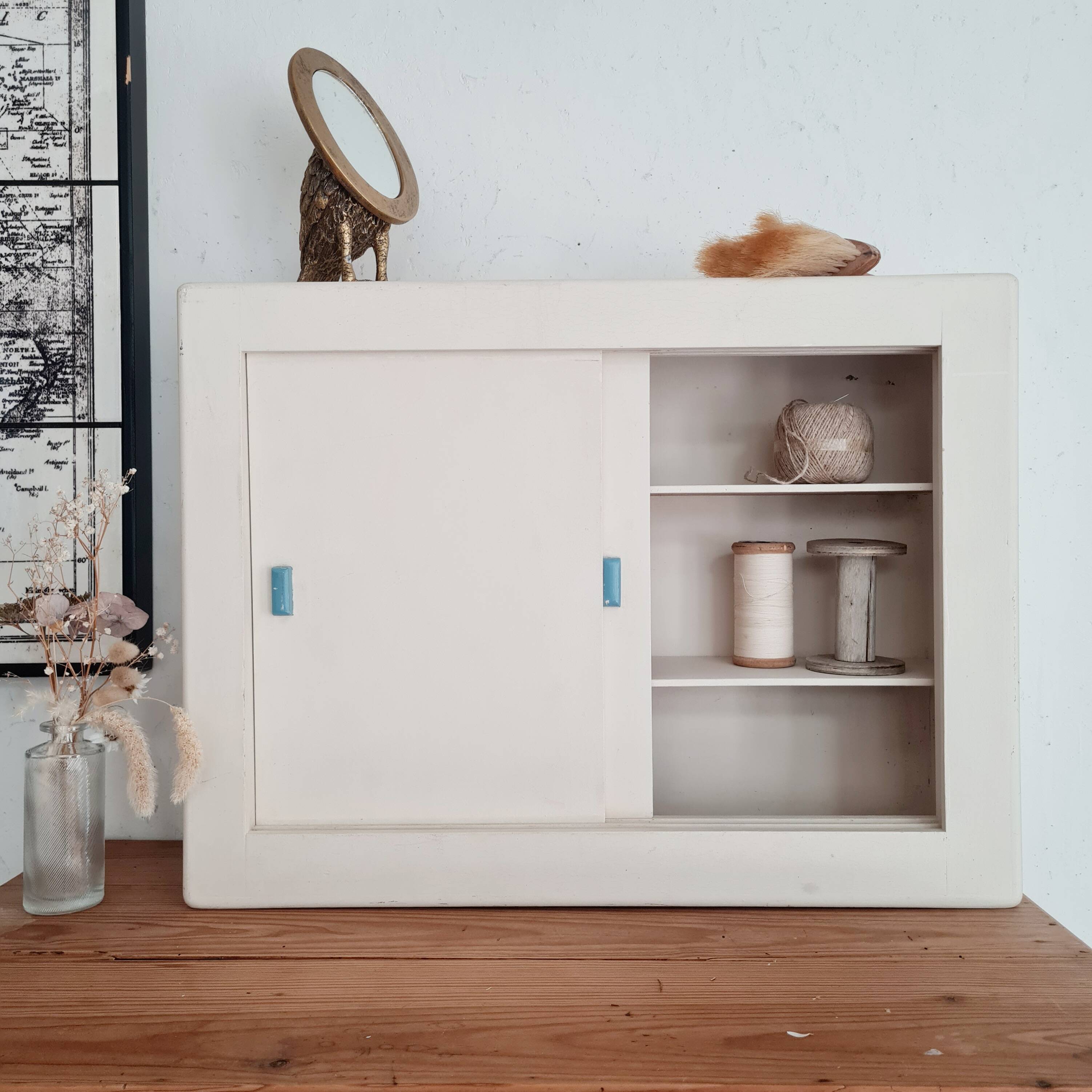 Old white medicine cabinet