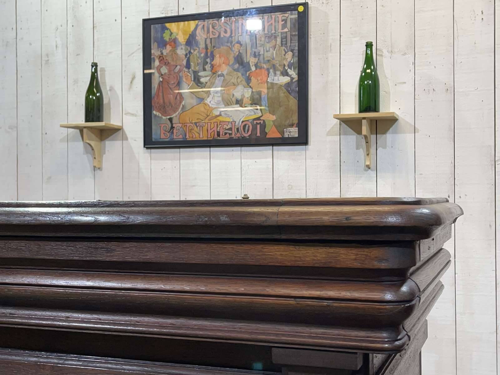 Comptoir de bar en chêne début XXème avec habillage d'époque zinc et étain