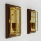 Paire d'appliques murales Sothis, structure bois, laiton et 3 faces en verre biseauté