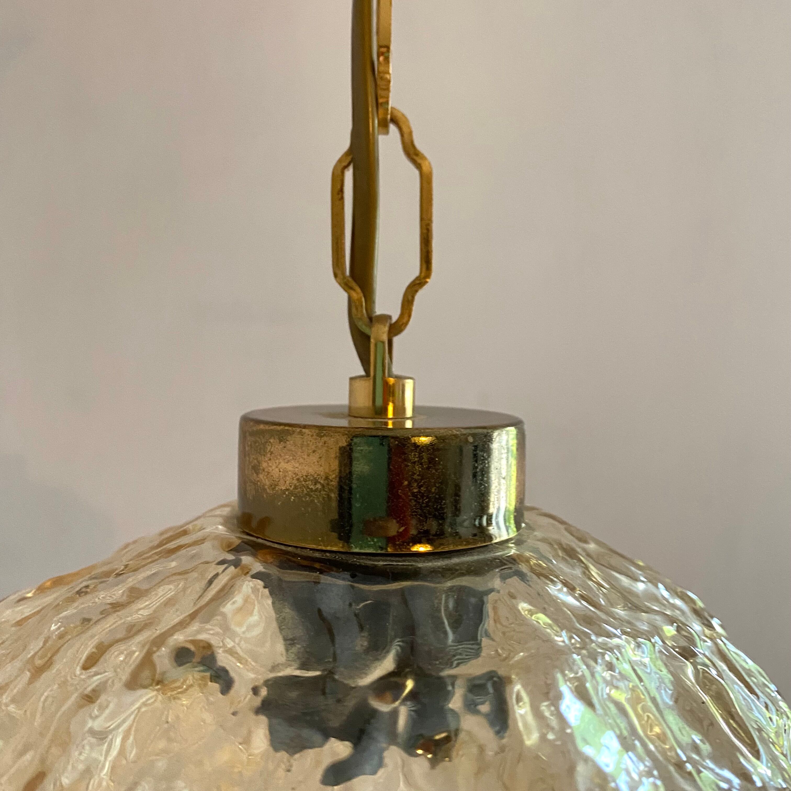 Pair of vintage amber glass pendant lamps