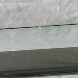 Glass and brass coffee table