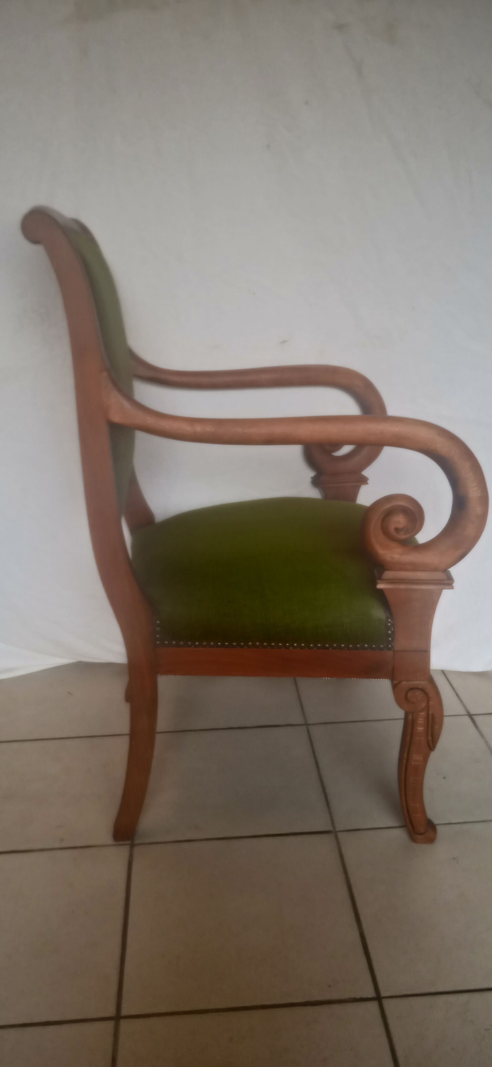 Green velvet armchair