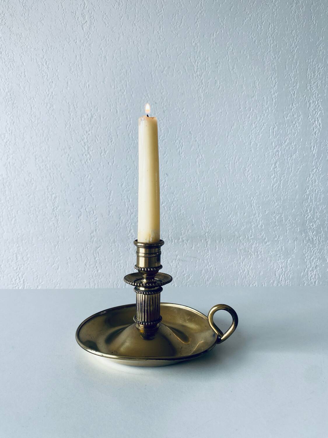 Candle holder with brass handle