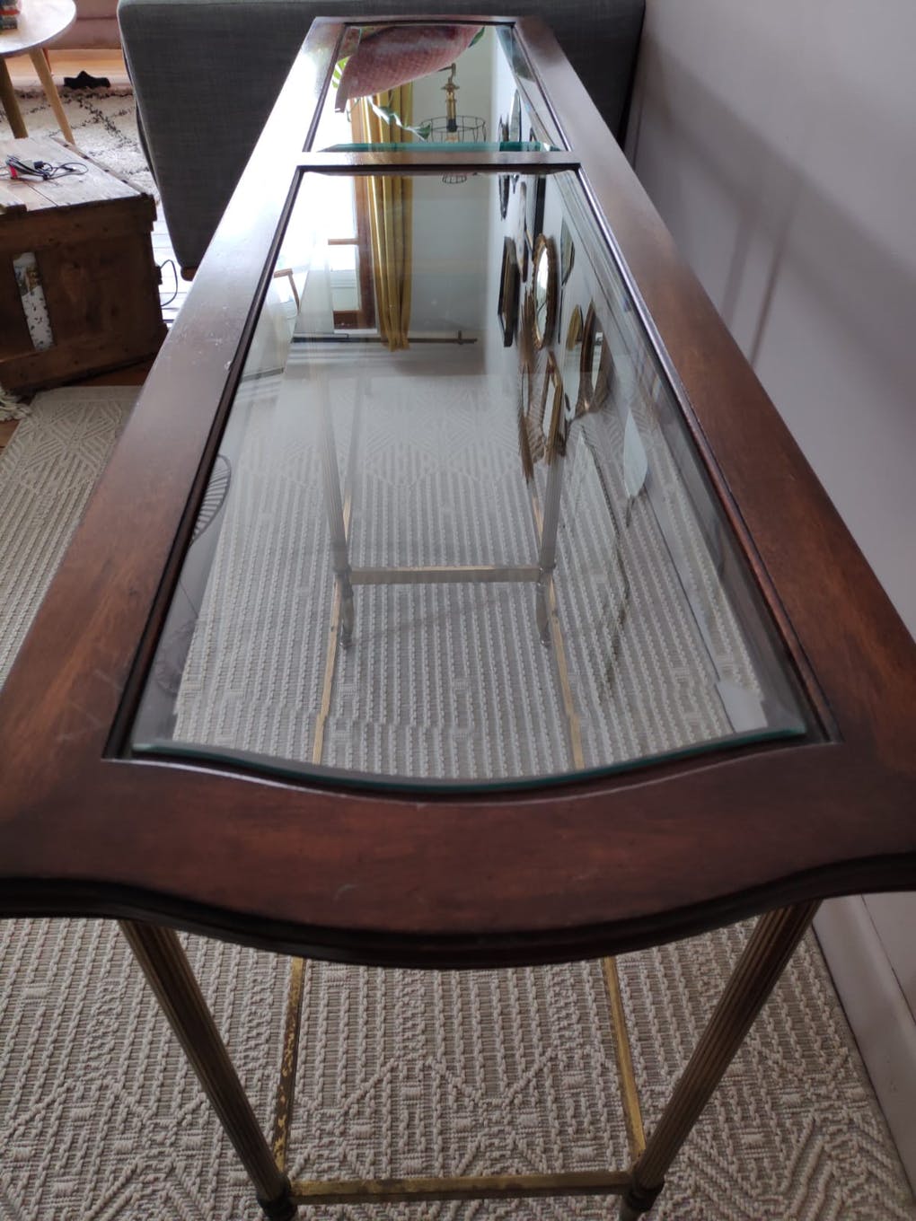 Glass and brass console table