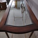 Glass and brass console table