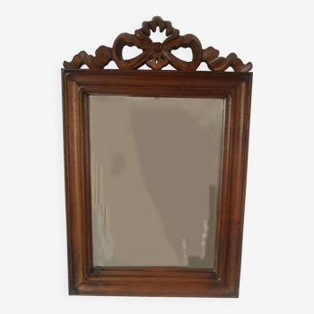 Miroir en bois à suspendre avec noeud sculpté vintage