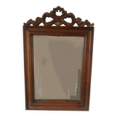 Wooden hanging mirror with vintage carved knot
