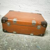 The cardboard suitcase