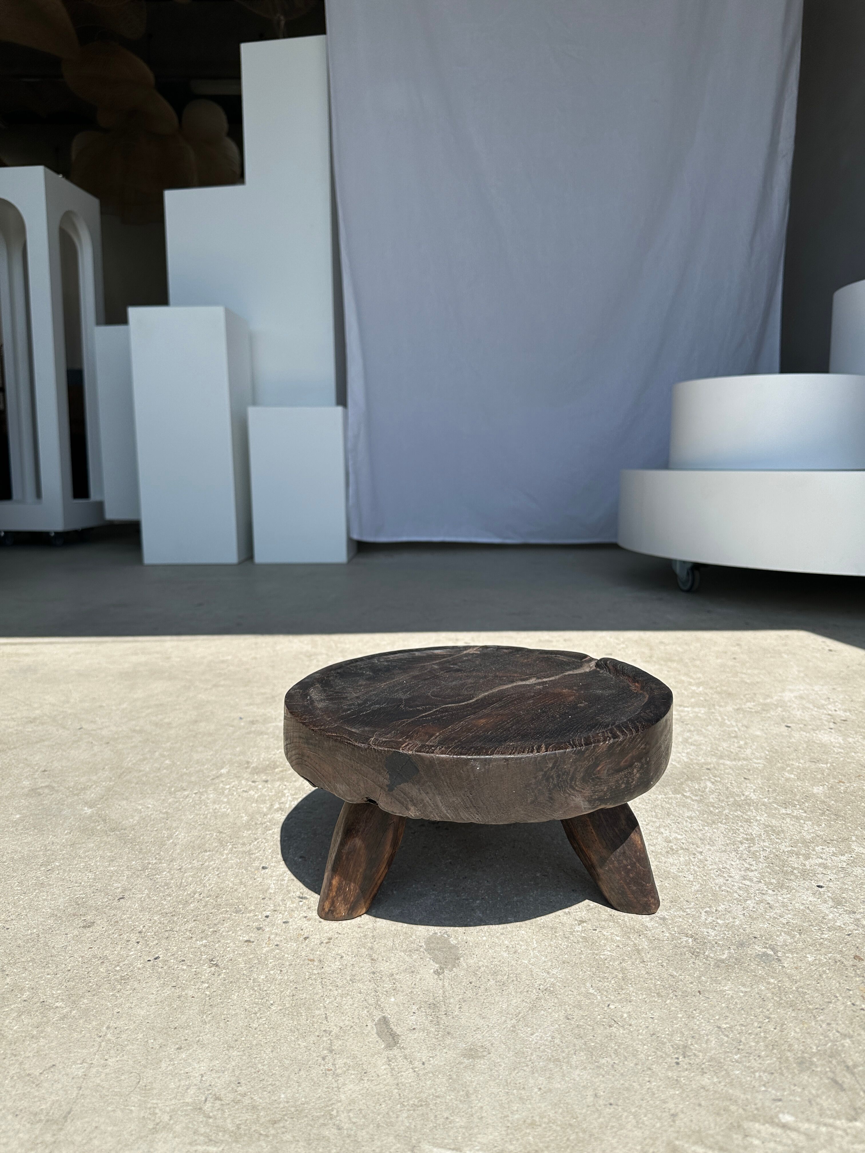 Small tripod stool low in dark brown upcycled teak