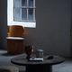 Round brutalist coffee table in stone and steel, mid-century French modernism, 1970s.