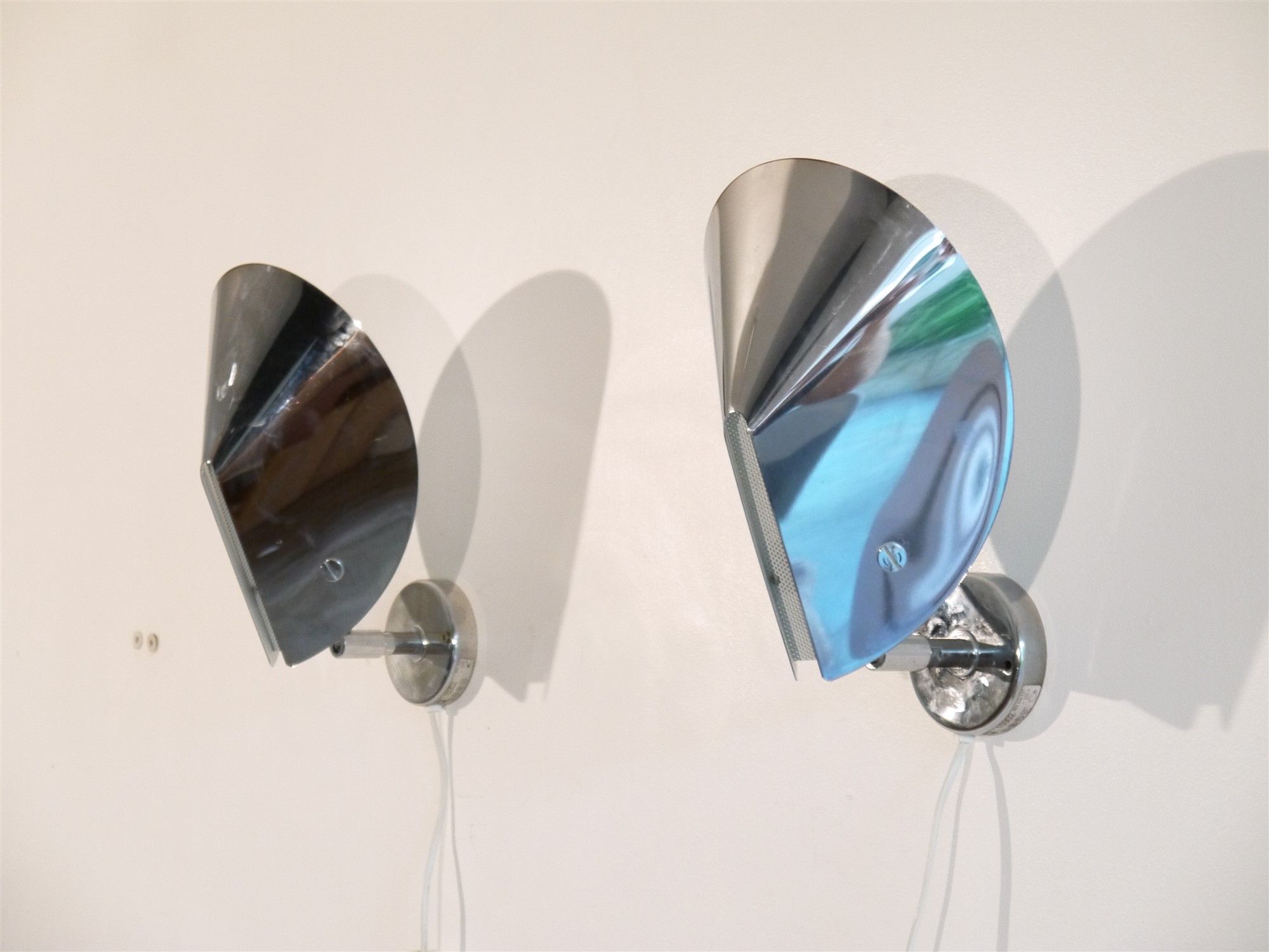 Pair of sconces in metal and chrome 1970