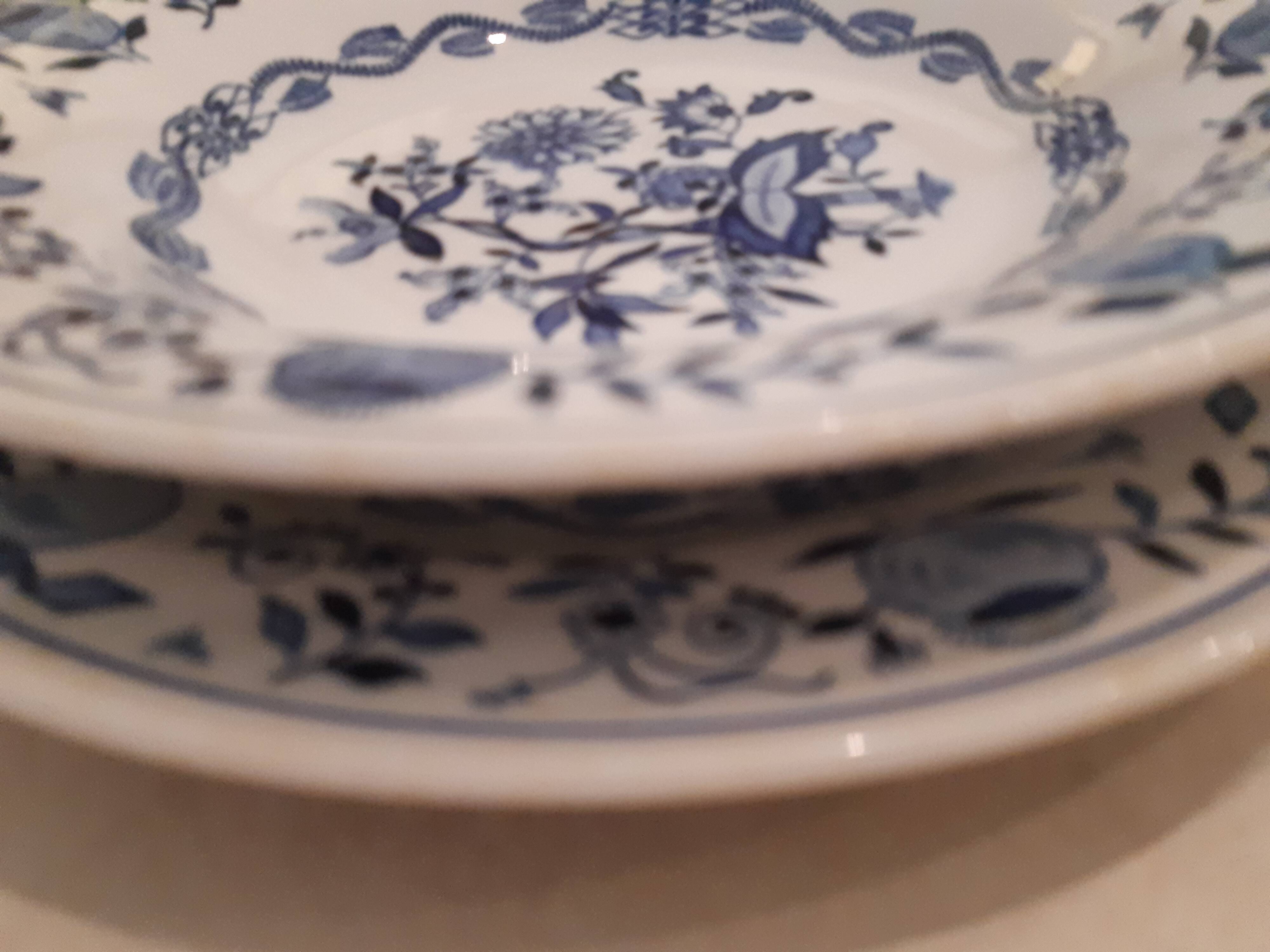 Set of two plates, flat and deep, with a country blue decoration.
