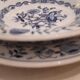Set of two plates, flat and deep, with a country blue decoration.