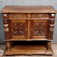 Renaissance style walnut sideboard with a concealed function