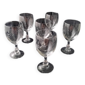 6 vintage wine glasses with baluster stems and engraved decoration on the bowl.