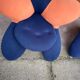 Pair of Lily chairs from the 1990s in blue and coral velvet, postmodern sculptural silhouette.