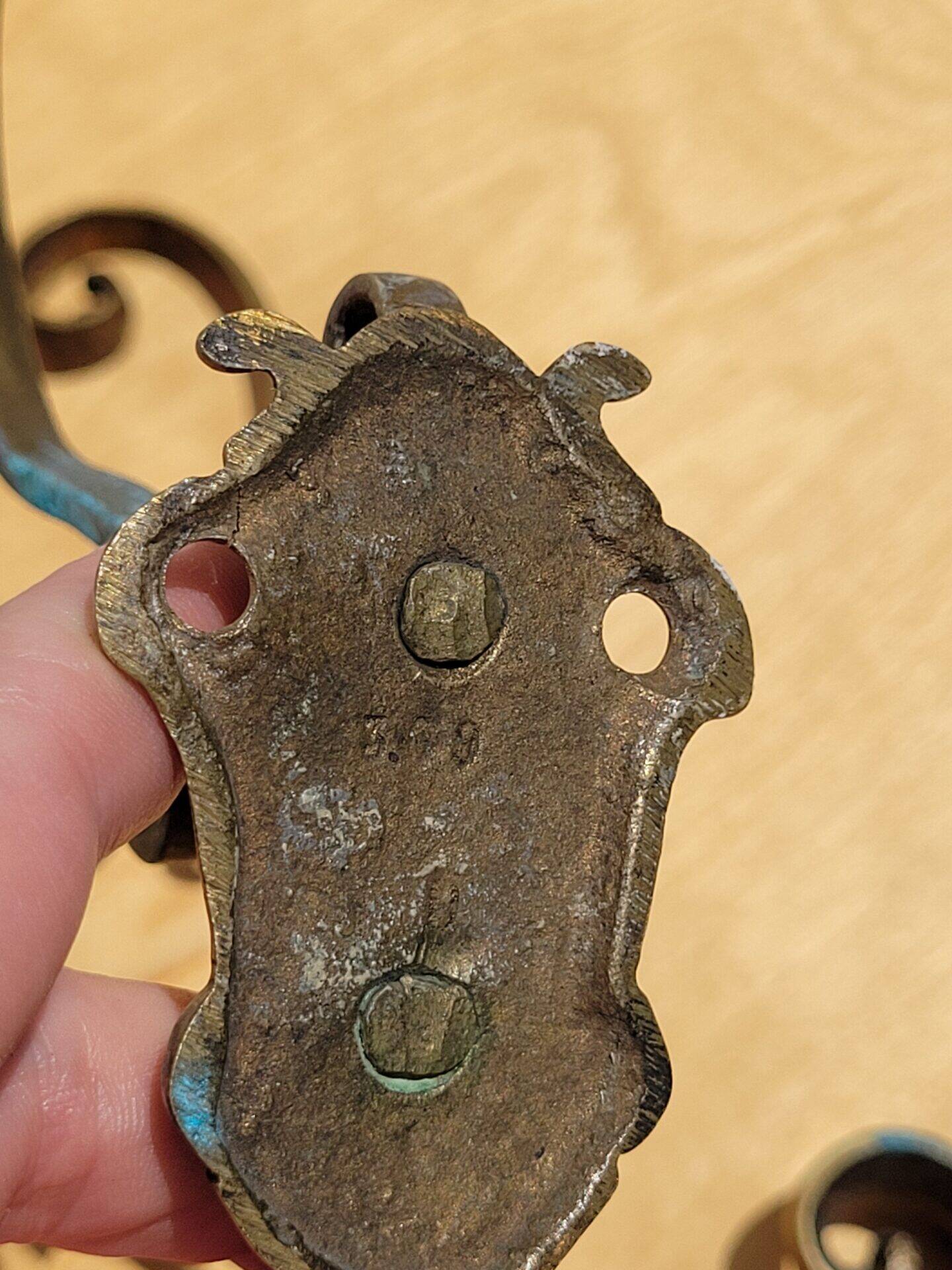 Pair of antique gilt bronze coat hooks