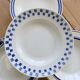 4 mismatched vintage deep plates in blue and white porcelain