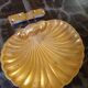 Vintage gilded bronze shell or shell pocket emptier