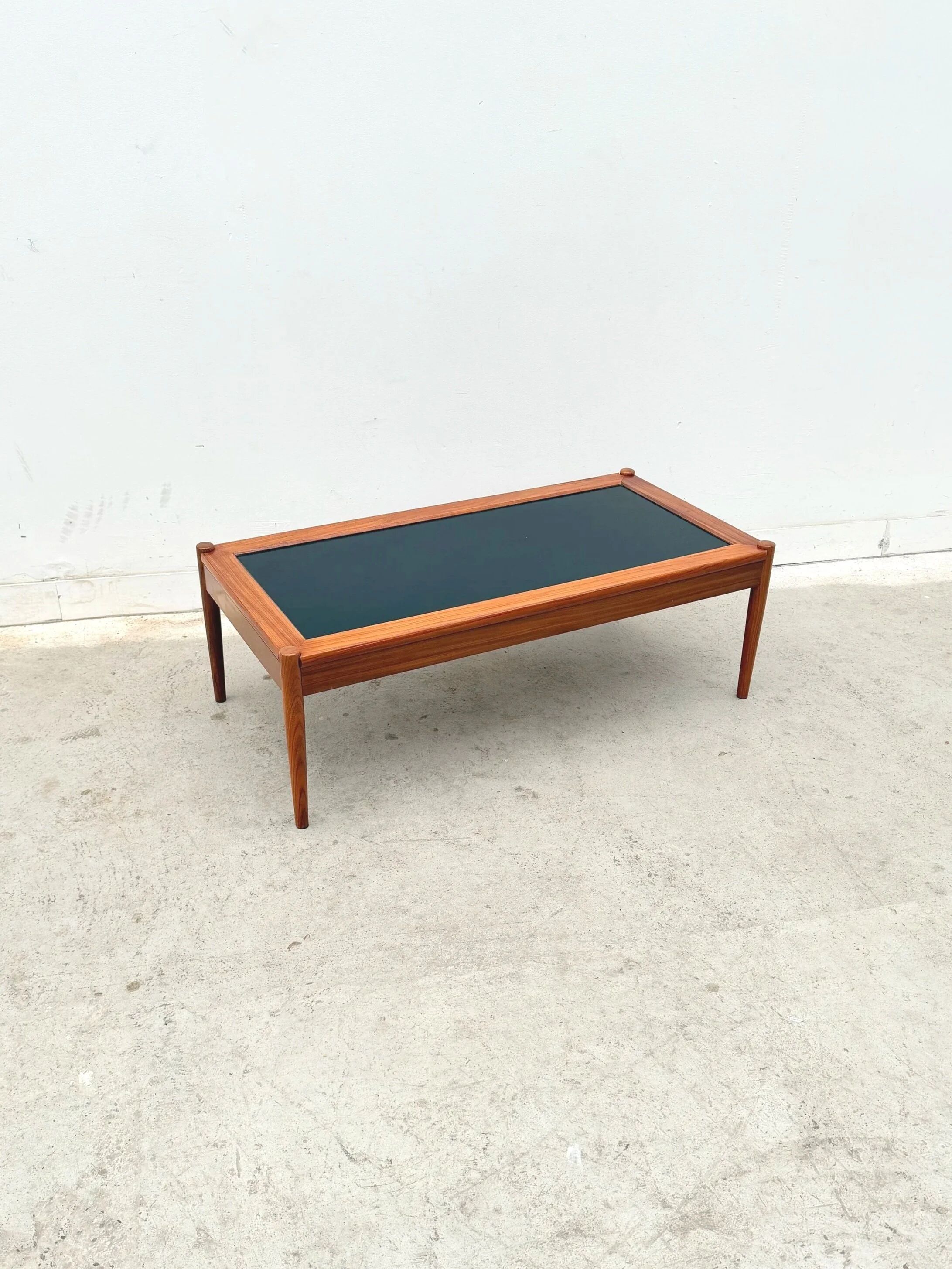 Scandinavian coffee table in teak and black formica, 1960.