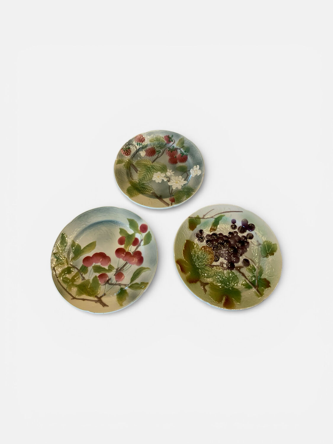 Set of 3 Saint-Clément majolica plates – fruit decoration – 19th century