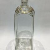 Bouteille en verre décoré de motifs doré