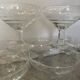 8 old champagne glasses