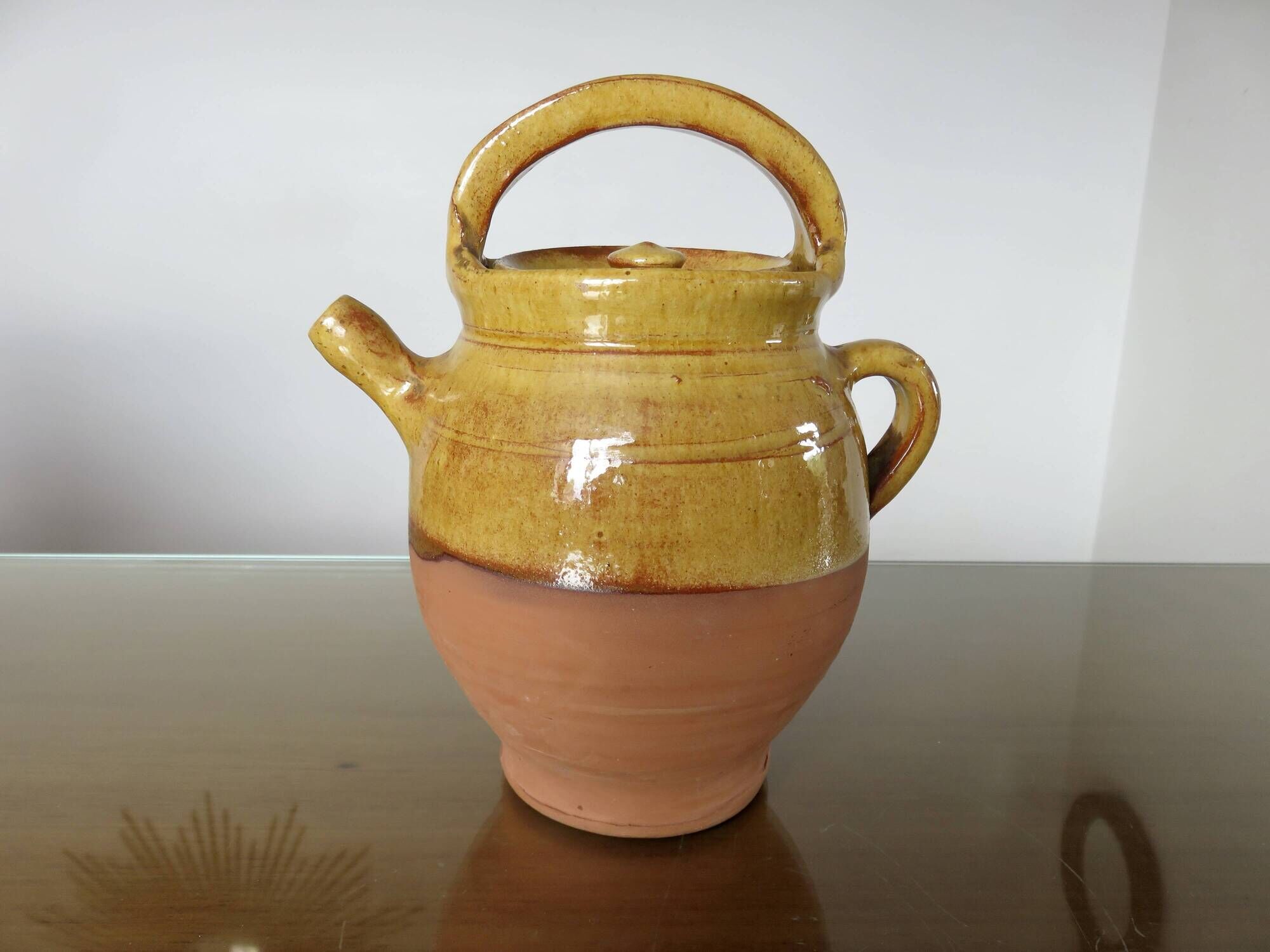 Glazed yellow terracotta jug, south-west of France.