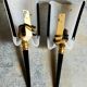 Pair of vintage plexi and bakelite 50s wall lamps