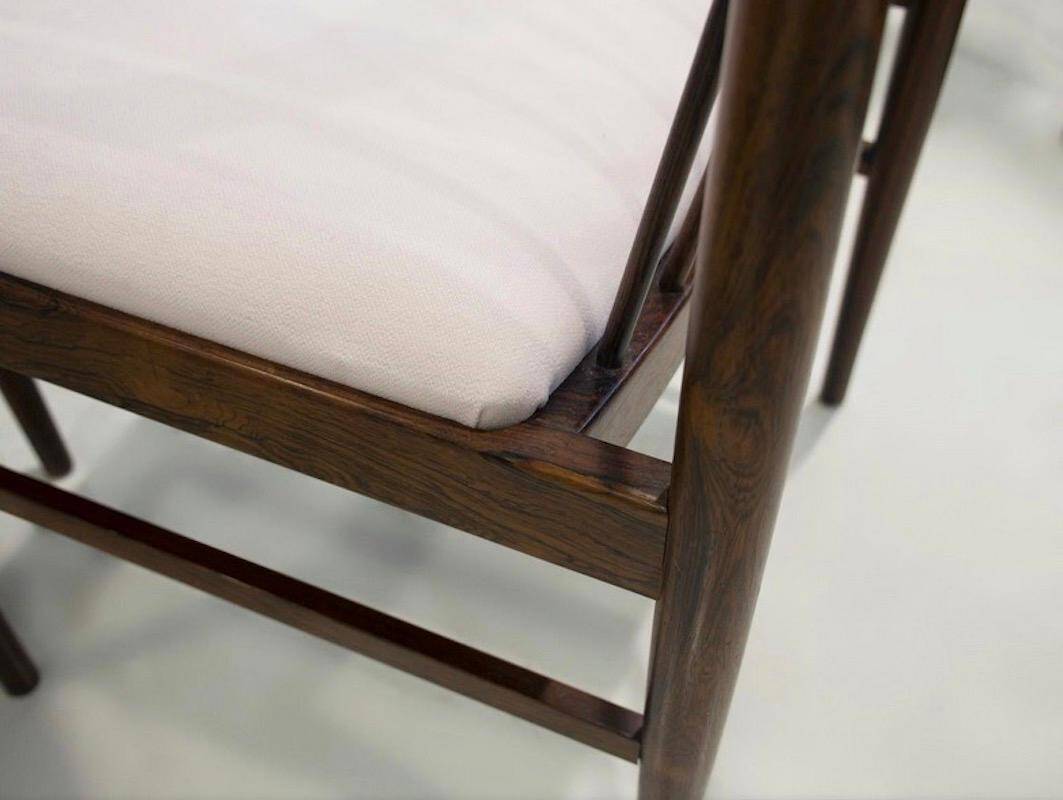 Set of six wooden dining chairs Arne Vodder Model No 422 with fabric upholstery.