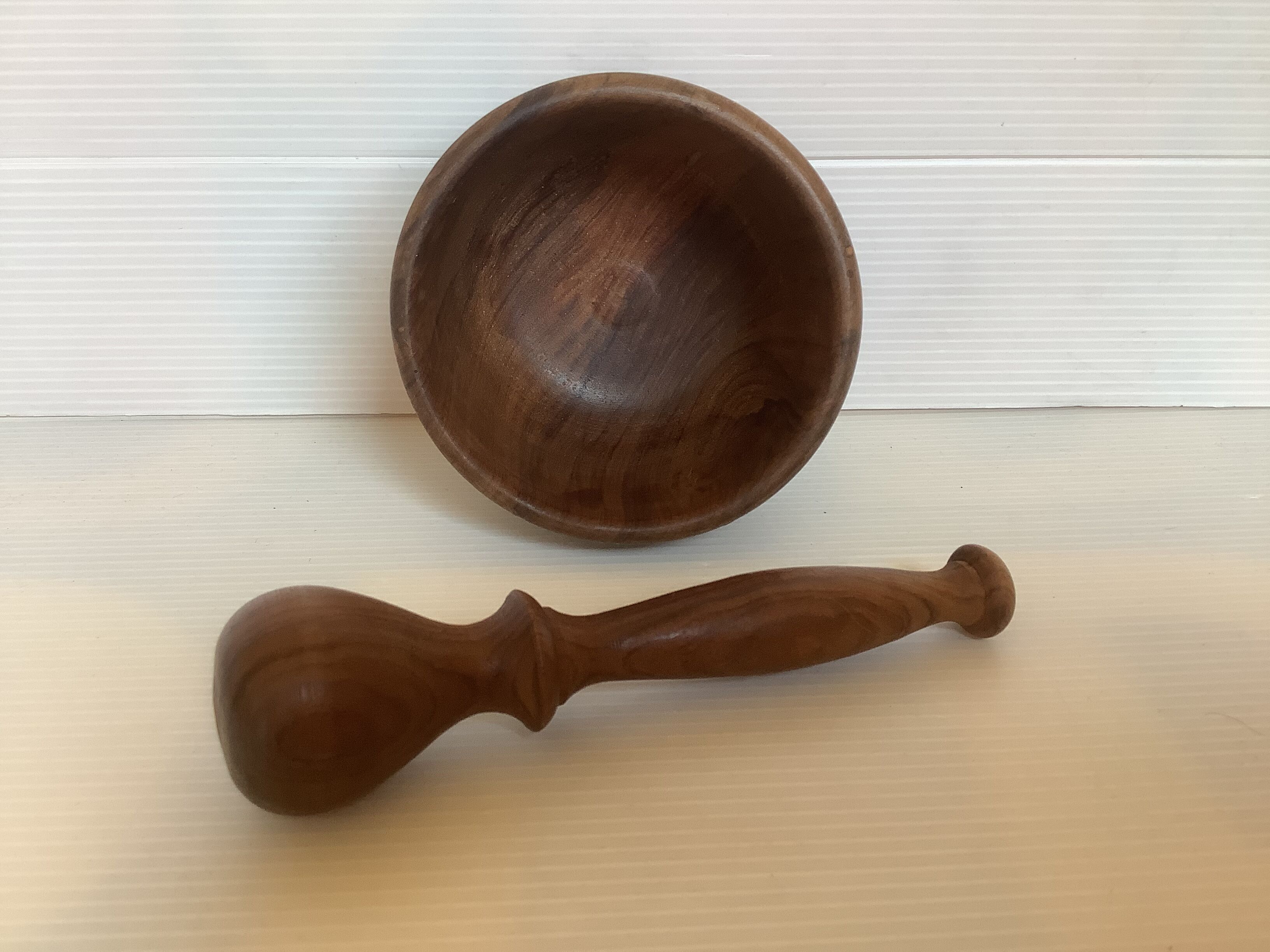 Mortar and wooden pestle